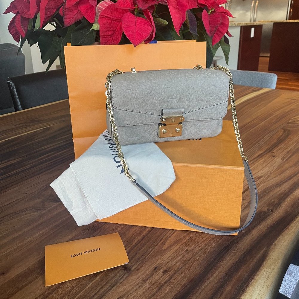 Authentic Louis Vuitton Marceau Empreinte Leather Handbag